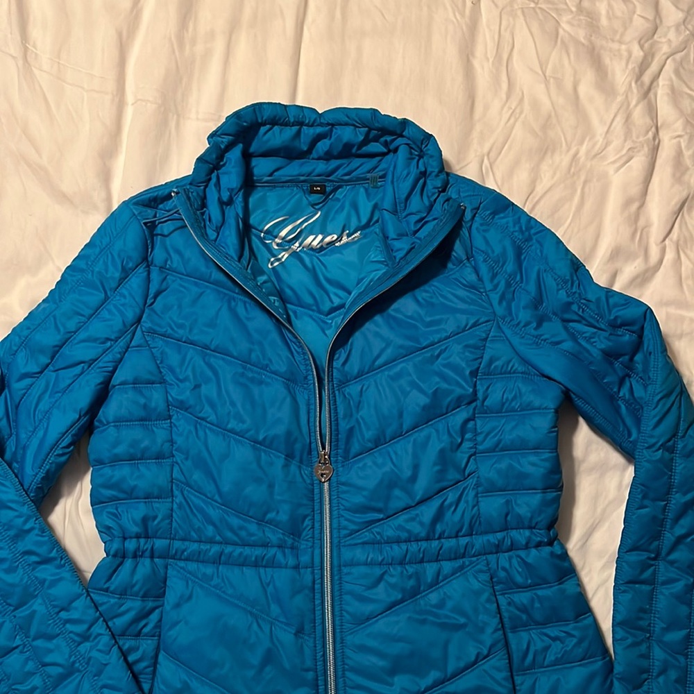 Guess lightweight jacket for junior .Color blue . Size L/G